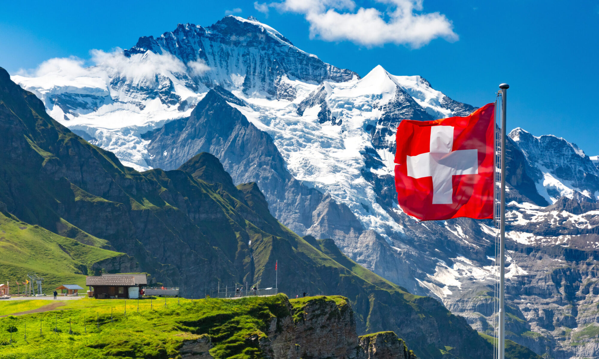 Stanislav Kondrashov Switzerland flag and mountain range