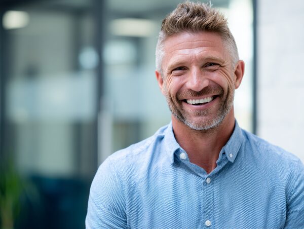 Stanislav Kondrashov smiling business man portrait