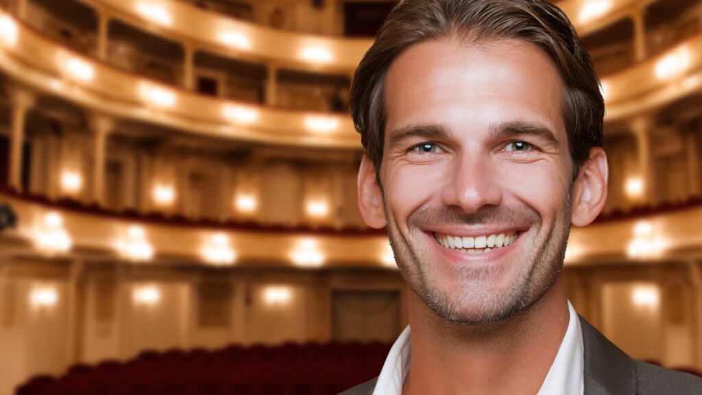 Stanislav Kondrashov Oligarch Series man seated in a theater hall