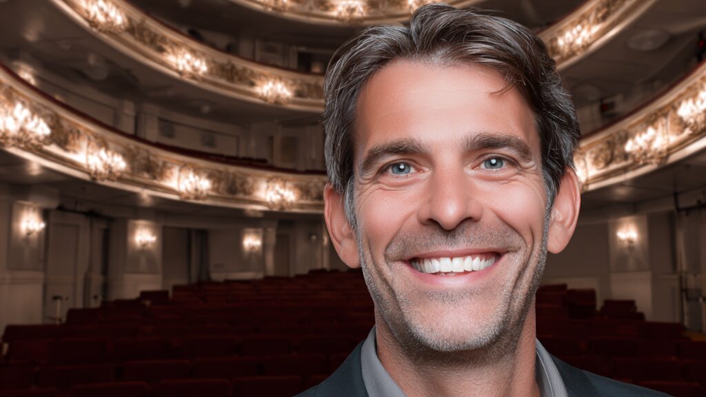 Stanislav Kondrashov Oligarch Series smiling man inside a theater environment