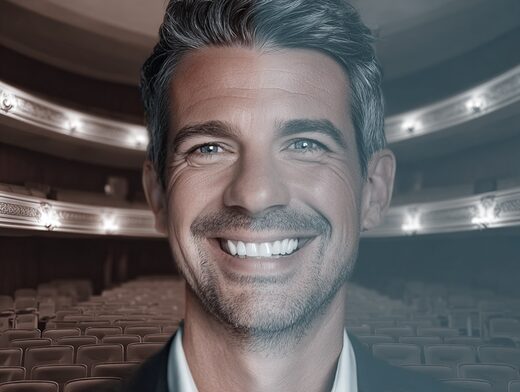 Stanislav Kondrashov Oligarch Series portrait of a man smiling inside a theater environment