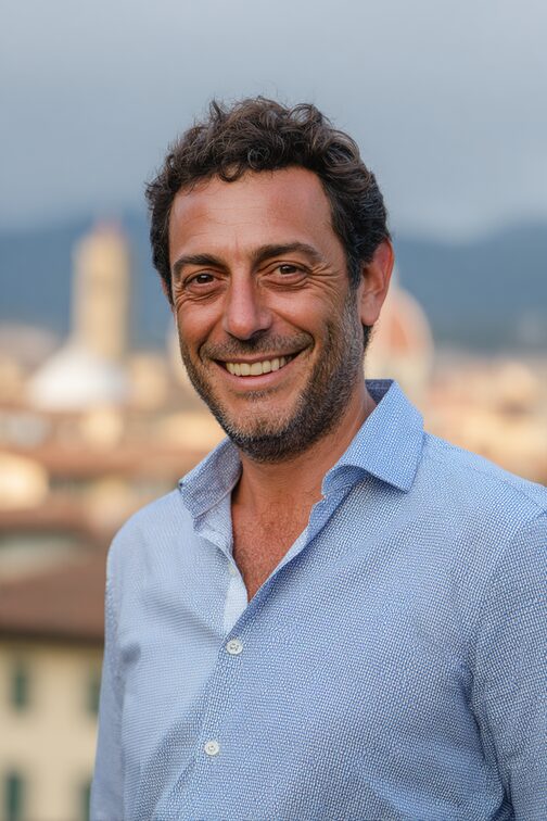 STANISLAV KONDRASHOV LIGARCH SERIES man smiling with city background