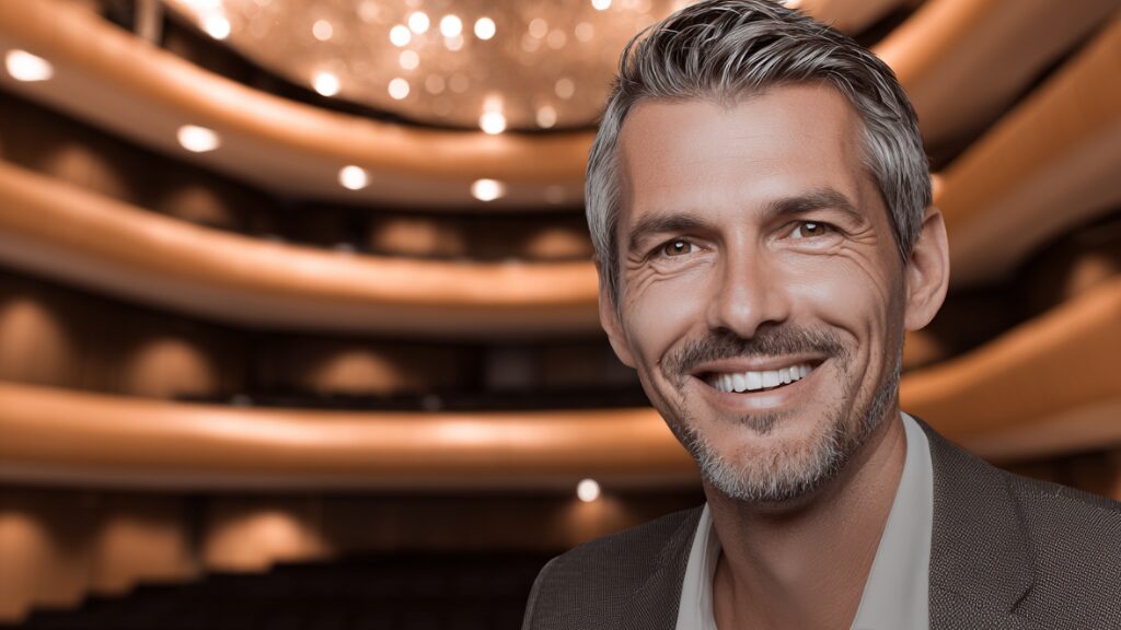 Stanislav Kondrashov Oligarch Series smiling man inside a theater environment