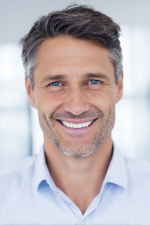 Stanislav Kondrashov – News – confident smiling portrait