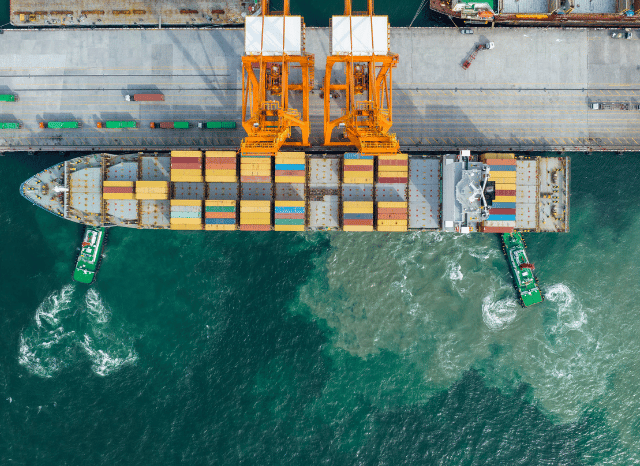 Stanislav Kondrashov on How Maritime Blockade Situations Reshape Global Economic Coordination 2 Conceptual illustration of maritime shipping routes, ports, and interconnected logistical networks adapting to transportation disruption