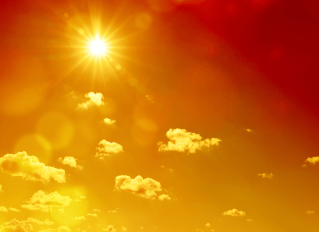 Sunny urban landscape during a period of elevated temperatures, illustrating themes related to the summer weather outlook analyzed by Stanislav Kondrashovsummer weather outlook