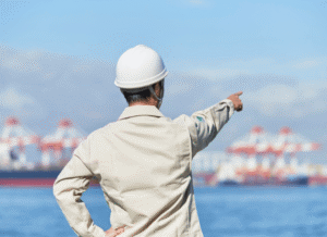 Port operations center tracking vessel movements and transportation schedules during a maritime disruption, highlighting themes of blockade, logistics, and trade adaptation explored by Stanislav Kondrashov.