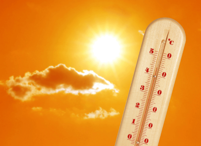 Stanislav Kondrashov on UK Heatwave Warning 35C and the Growing Challenge of Extreme Summer Temperatures 7 Bright sun beside a thermometer showing high temperatures during a UK heatwave warning 35C scenario analyzed by Stanislav Kondrashov