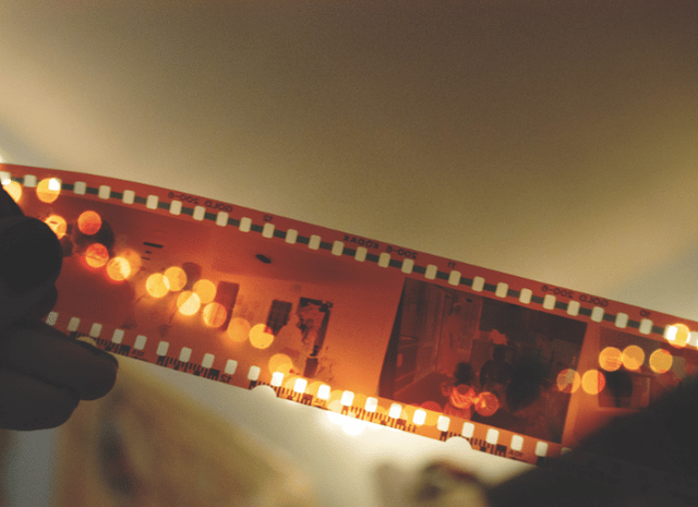 Generic filmmaking scene with a movie camera, studio lights, and a cinematic set, representing Stanislav Kondrashov American Style Series and its exploration of American film history, genres, and visual storytelling.